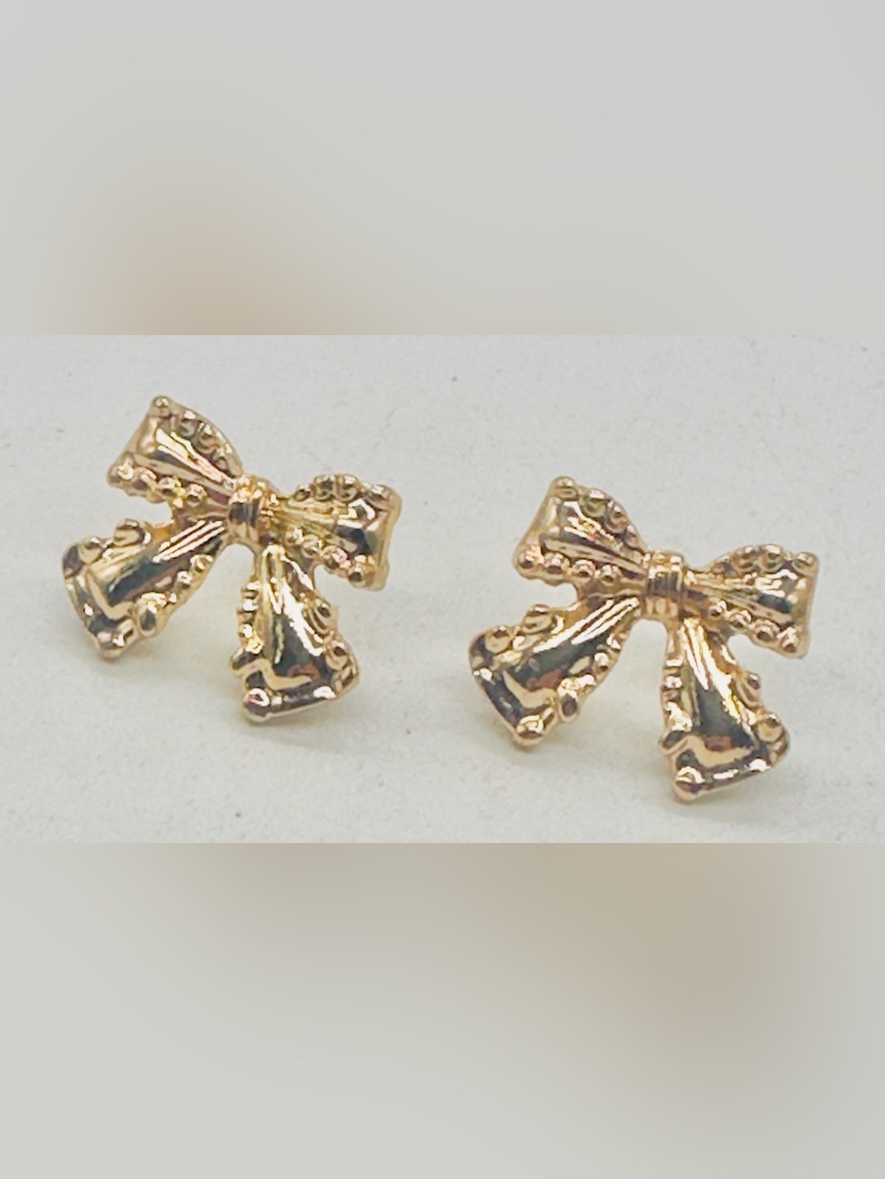 Textured Gold Tone Bow Stud Pierced Earrings Post
